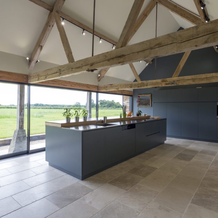 breakfast bar and glass wall in modern kitchen 2025 04 04 15 46 47 utc1