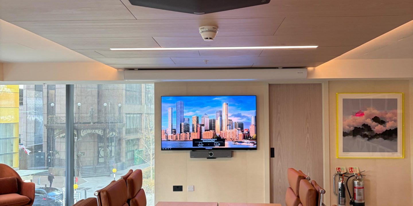 Boardroom AV installation Kensington London with Sony projector and Samsung TV by Vertex AV